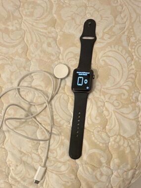 Apple Watch with black Silicone Band and Magnetic Charger. Used